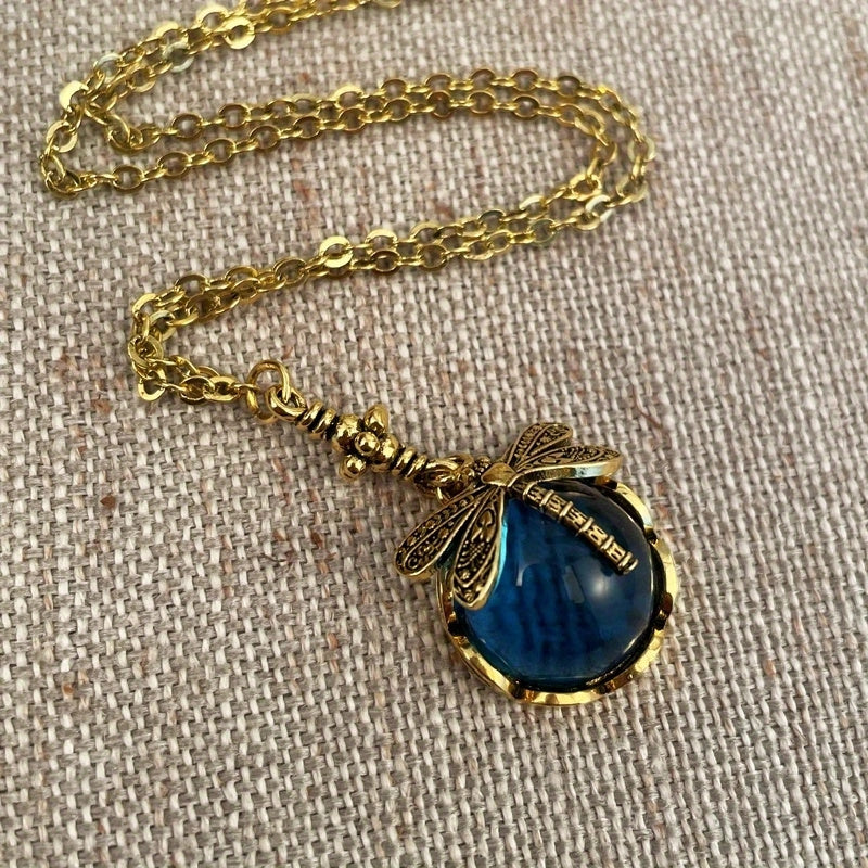 Vintage Metal Dragonfly Earrings with Inky Blue Moonstone and Brass Glass Cabochon