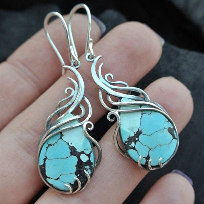 Add a touch of vintage boho elegance with these Green Synthetic Gemstone Drop Earrings in 925 Silver Plated Ear Decoration Jewelry