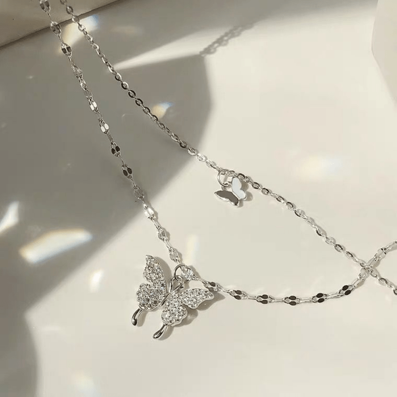 Make a Statement with this Double Butterfly Layered Necklace featuring a Shiny Zircon Pendant - Perfect for Parties and Gifting