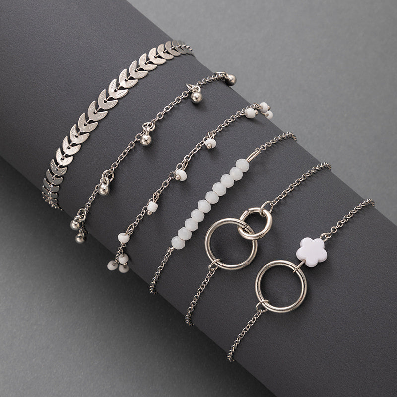 Upgrade Your Jewelry Game with 6-Piece Stackable Chain Bracelet Set Featuring Hollow Out Geometry and Adjustable Tassel