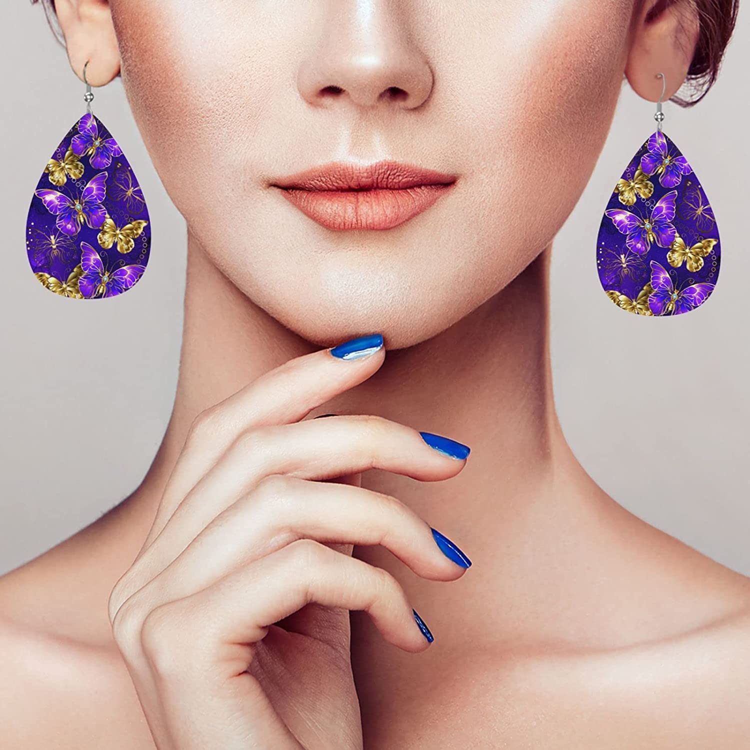 Flutter in Style with our Purple Butterfly Faux Leather Teardrop Dangle Earrings for Women and Girls