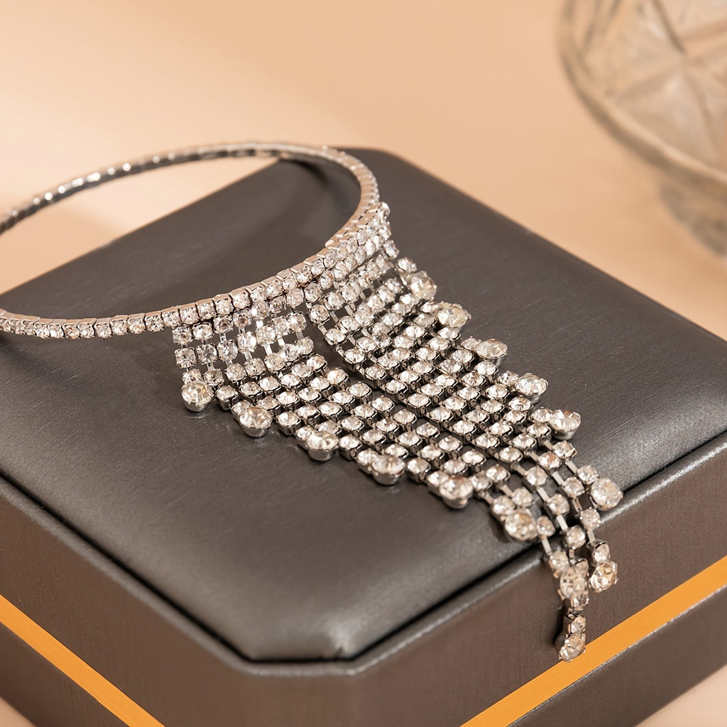 Shine Bright with our Rhinestone Tassel Chain Arm Bracelet