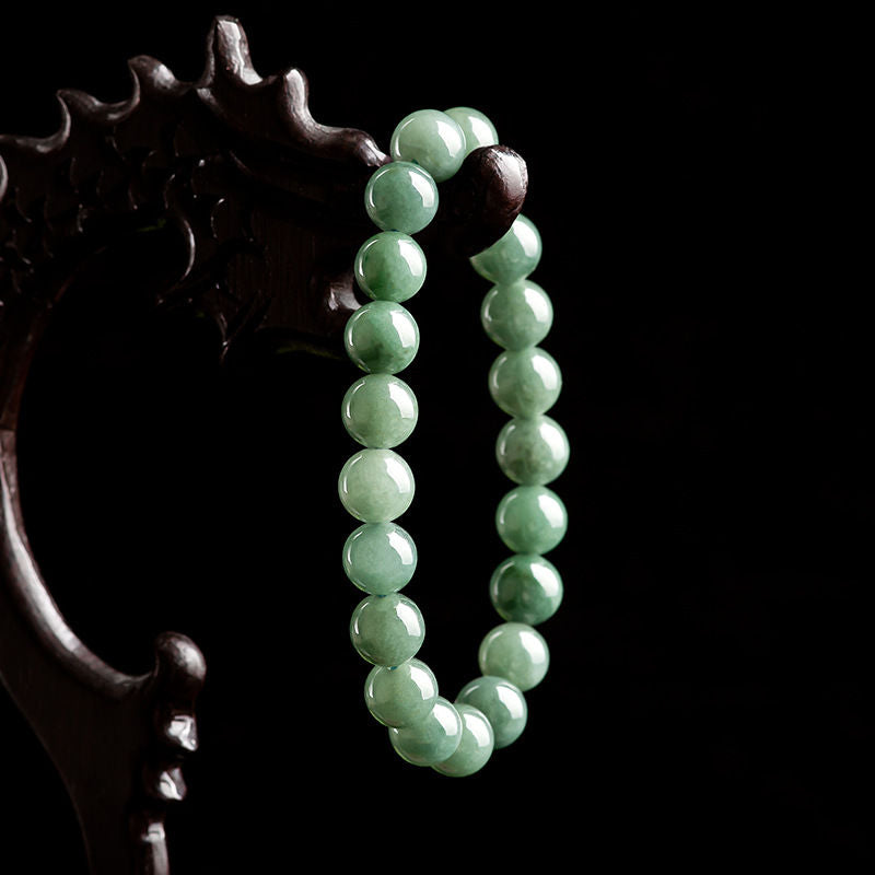 Stay Cool and Stylish with our Natural Jade Beaded Stretch Bracelet - Minimalist Design in Oil and Bit Green