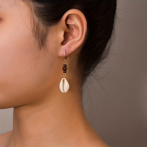 Add a touch of vintage elegance with our Seashell Dangle Wooden Bead Earrings for Women