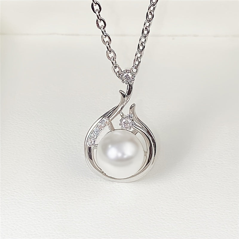 Add a touch of elegance to your outfit with our Pearl Pendant Necklace for Women - the perfect accessory for any occasion!