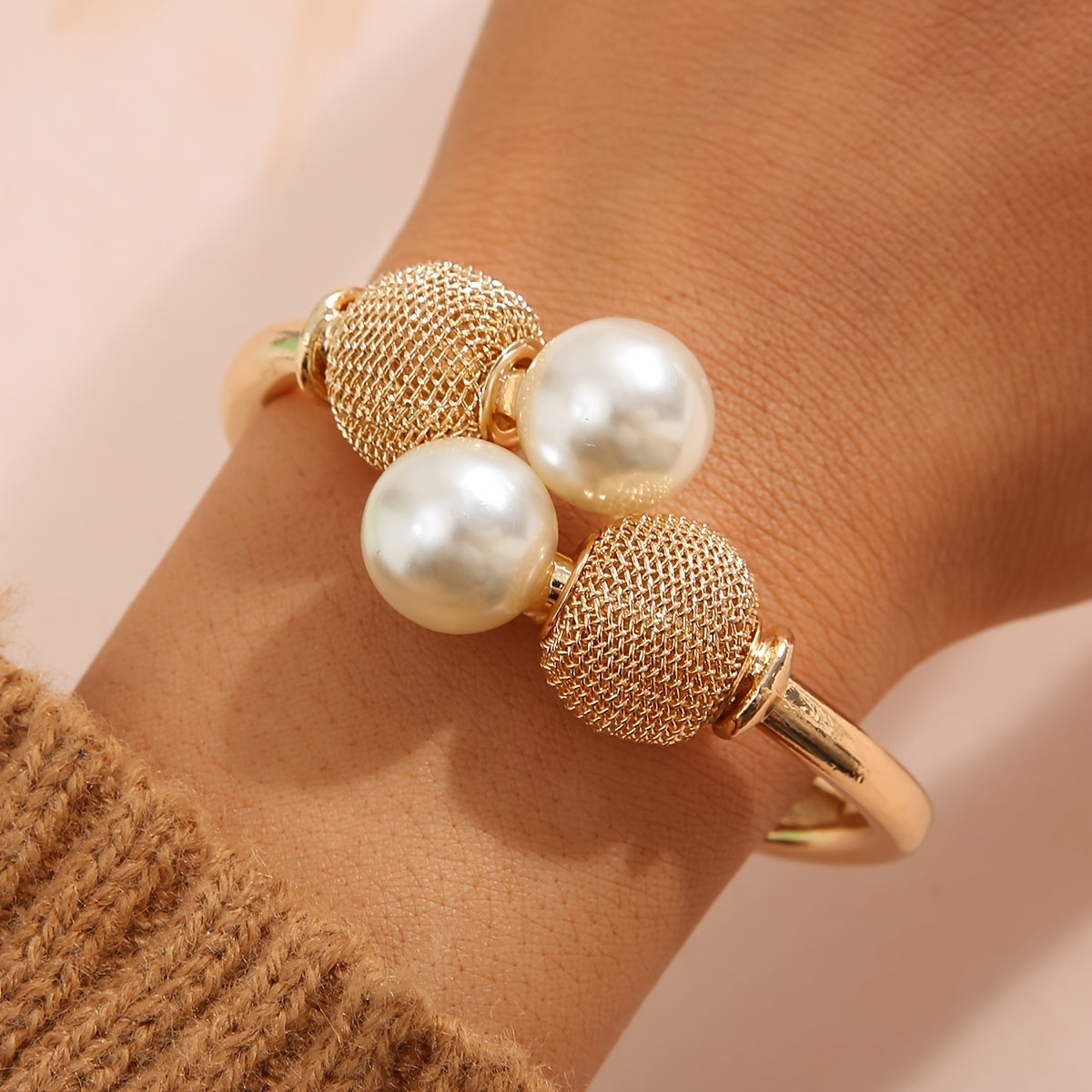 Make a Statement with our Exaggerated Alloy Open Bangle Bracelet Adorned with Large Faux Pearls