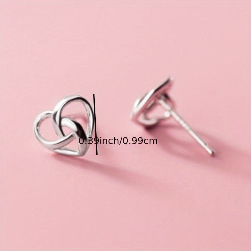 Add a Touch of Love to Your Daily Look with our Hollow Silvery Heart Knotted Stud Earrings