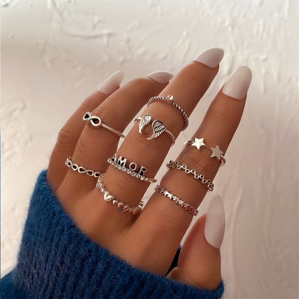 Complete Your Vintage Look with our 9-Piece Silver Wing Heart Star Letter Rhinestone Ring Set - Adjustable and Heart Shaped Jewelry for a Perfect Fit!