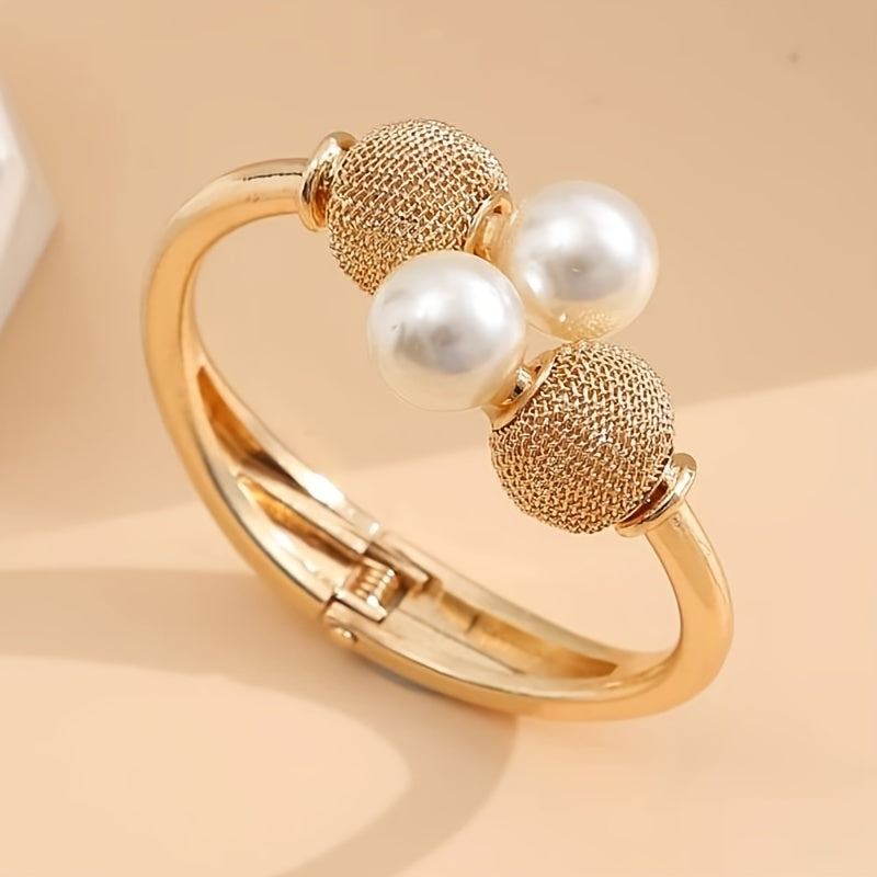 Make a Statement with our Exaggerated Alloy Open Bangle Bracelet Adorned with Large Faux Pearls