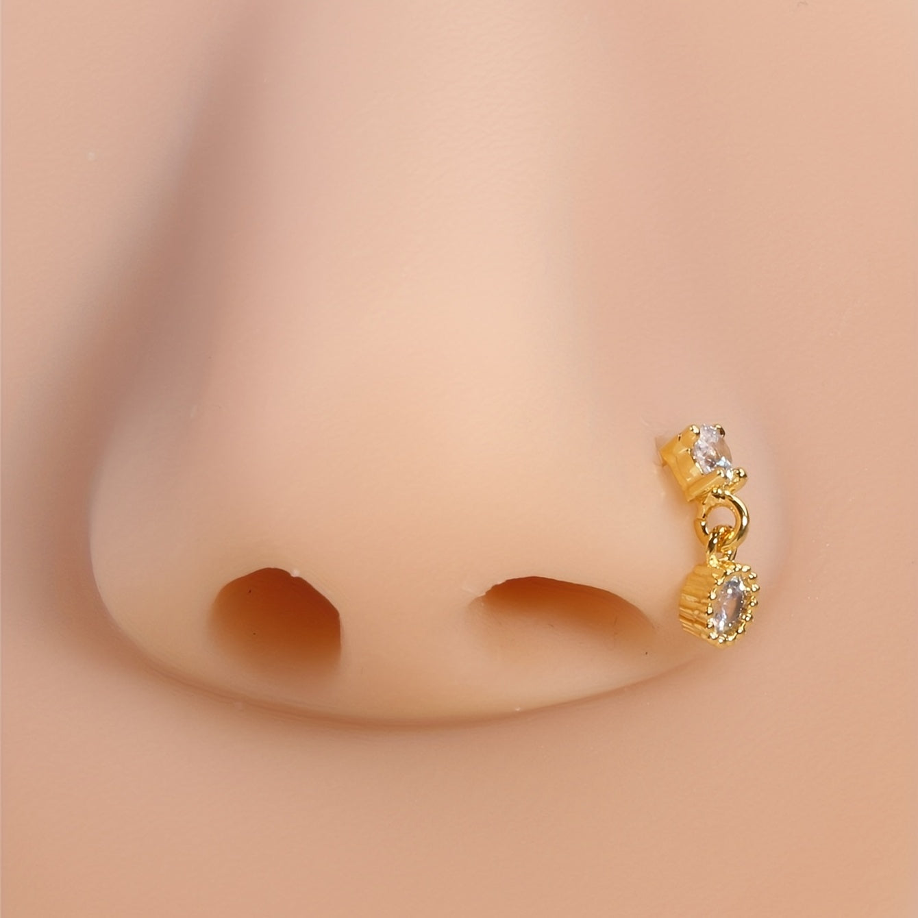 Add a Unique Touch to Your Look with our Dangle Nose Ring Inlaid with Round Cut Shiny Zircon - Perfect for Body Piercing Jewelry!
