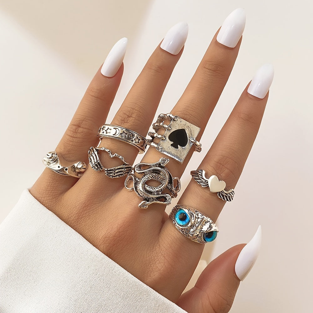 Unleash Your Inner Punk with 7pcs Vintage Silver Color Ring Set Featuring Black Heart, Snake and Owl Patterns for Women's Casual and Party Wear