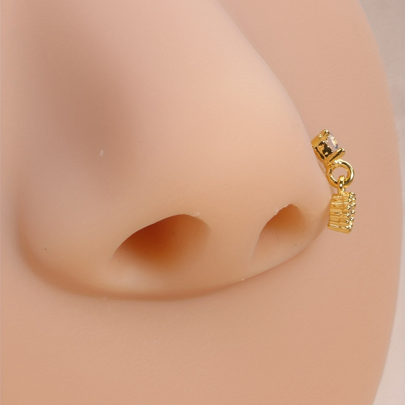 Add a Unique Touch to Your Look with our Dangle Nose Ring Inlaid with Round Cut Shiny Zircon - Perfect for Body Piercing Jewelry!