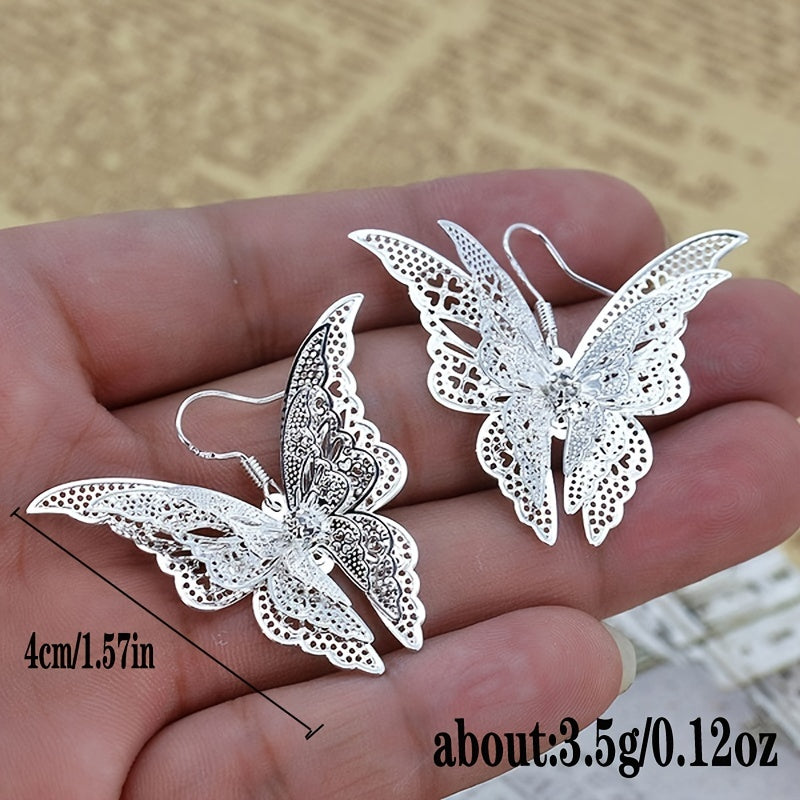 Add a Touch of Charm to Your Look with Women's Delicate Hollow Out Butterfly Hook Earrings - Silver Plated