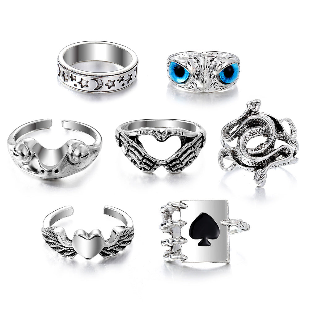 Unleash Your Inner Punk with 7pcs Vintage Silver Color Ring Set Featuring Black Heart, Snake and Owl Patterns for Women's Casual and Party Wear