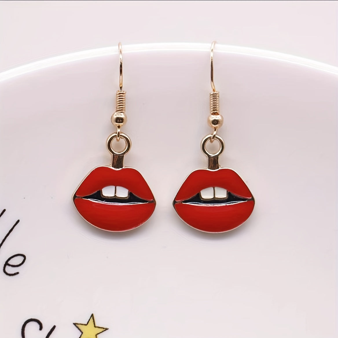 Make a statement with these vintage red lips drop earrings - perfect for parties and costumes