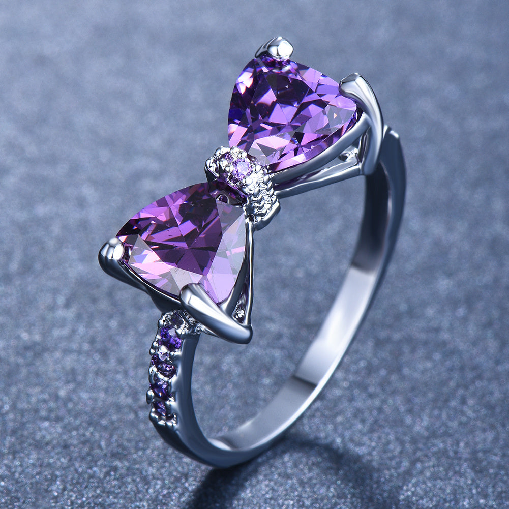 Sparkle on Your Special Day with Our White Crystal Marriage Ring - Ladies Silver Four Claw Bow Ring with Geometric Zircon Design - Perfect Birthday, Engagement or Wedding Gift for Women - Elegant Rhinestone Jewelry Accessory