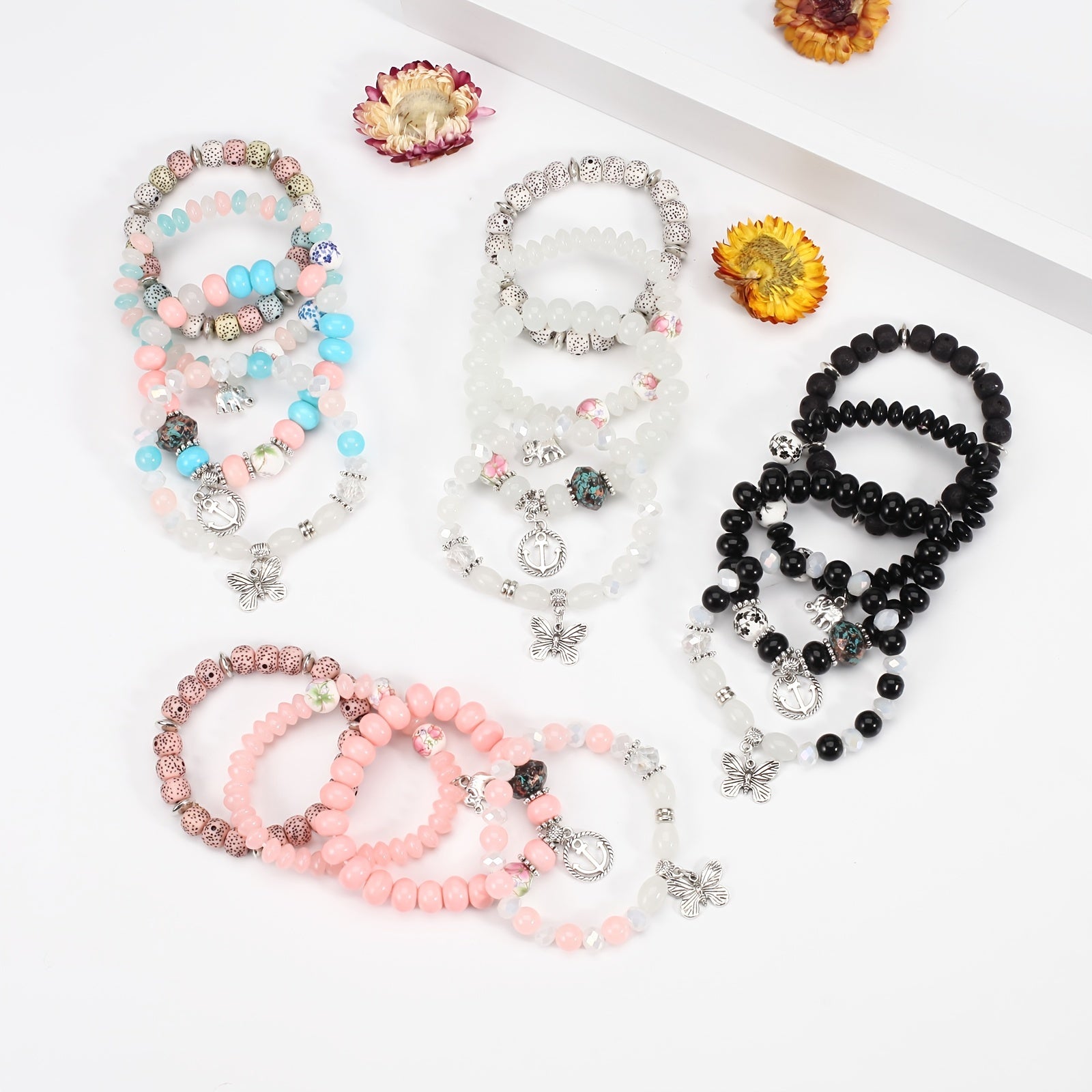 Bohemian Layered Beaded Bracelet with Elephant, Anchor, and Butterfly Pendants