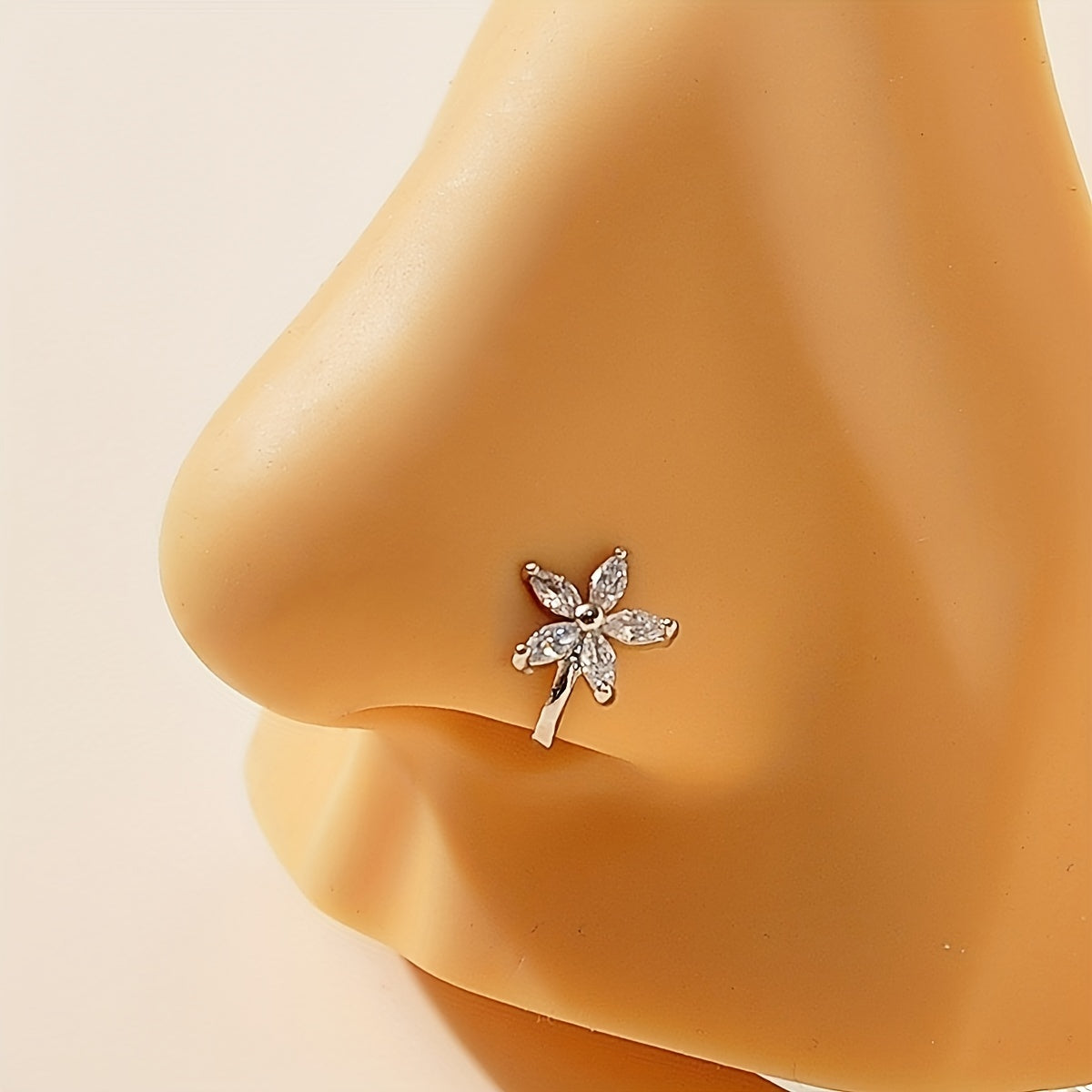 Add a touch of elegance with our Simple Flower Copper Nose Clip - No Piercing U-Shape Nose Jewelry Decor