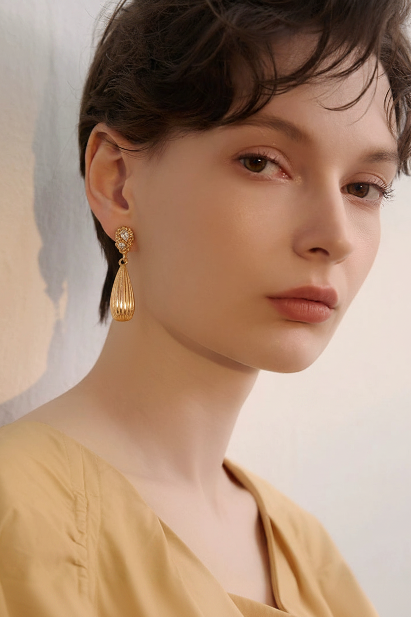 Gold Ribbed Teardrop CZ Stud Drop Earrings on Model