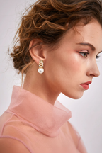 Gold Wave Pearl Drop Earring on Model