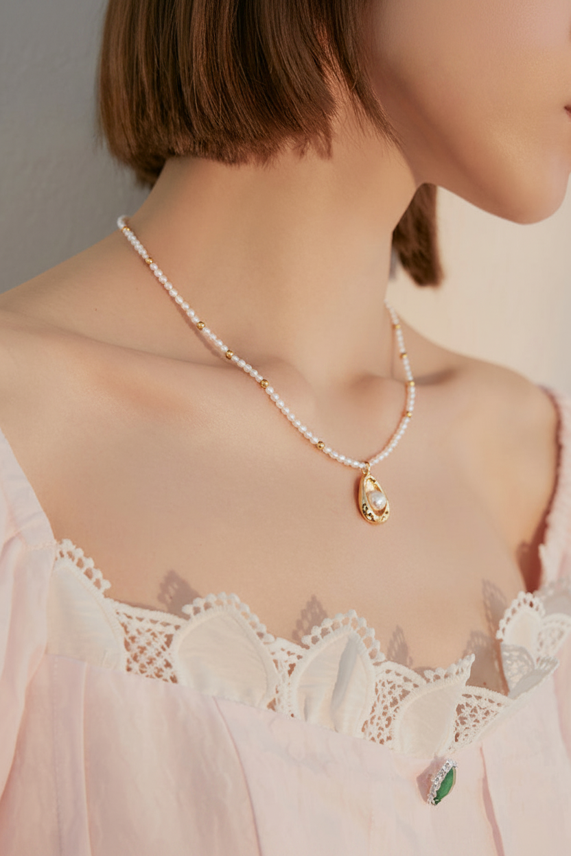 Pearl Seed Necklace with Molten Gold Pearl Pendant on Model