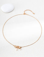 S925 Silver Vintage Gold Sculptural Bow & Natural Pearl Drop Necklace LOJ102